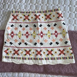 White skirt with colorful Aztec detailing